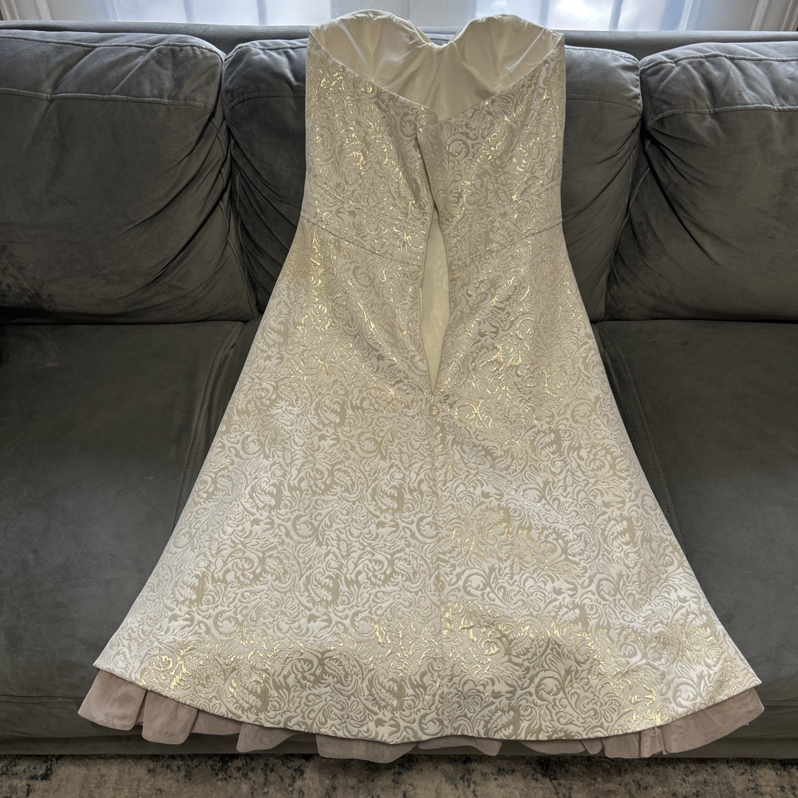 Vintage-style, tea-length halter wedding dress in champagne brocade.