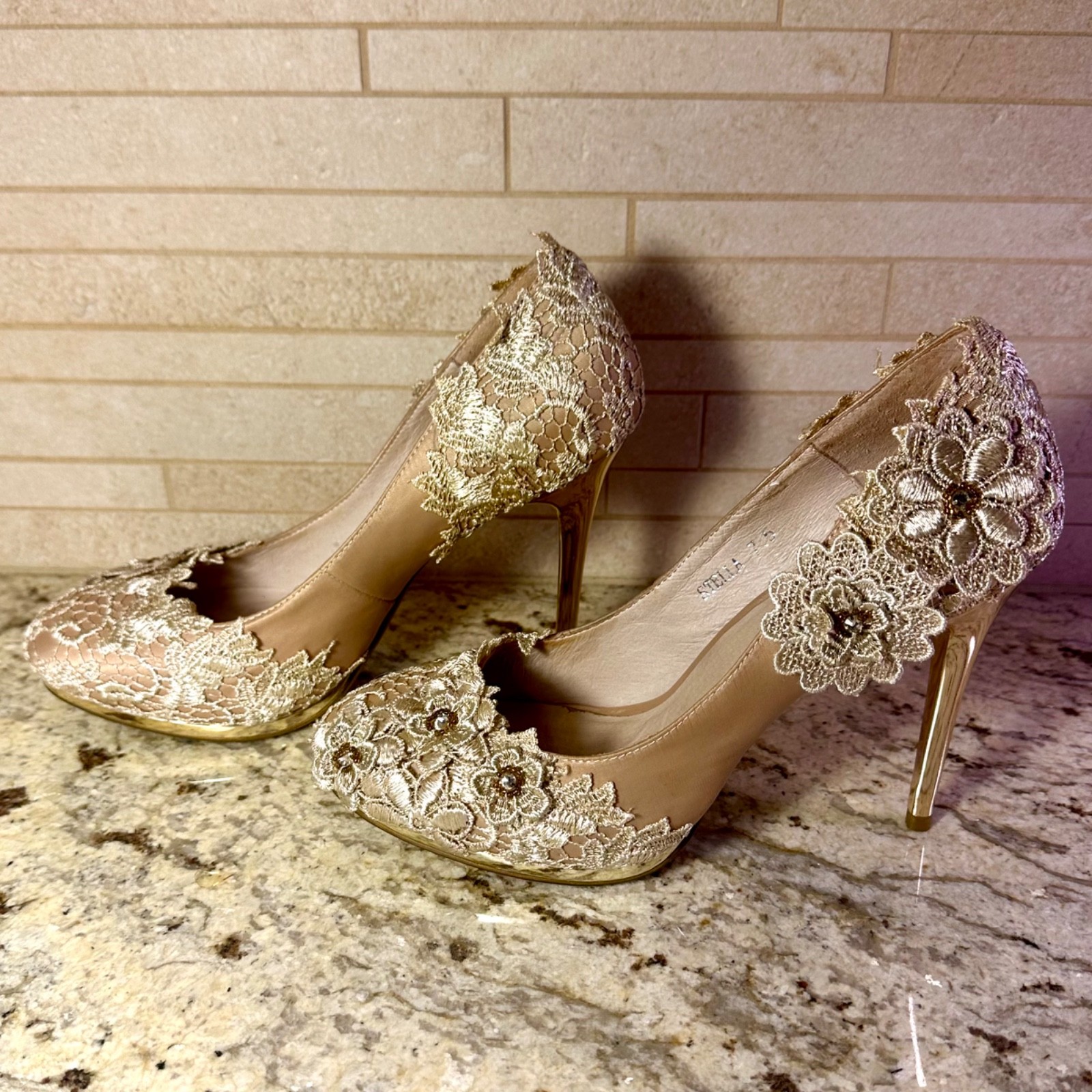 Stella stilettos, pumps by Bella Belle, women’s size 7 1/2. In floral champagne