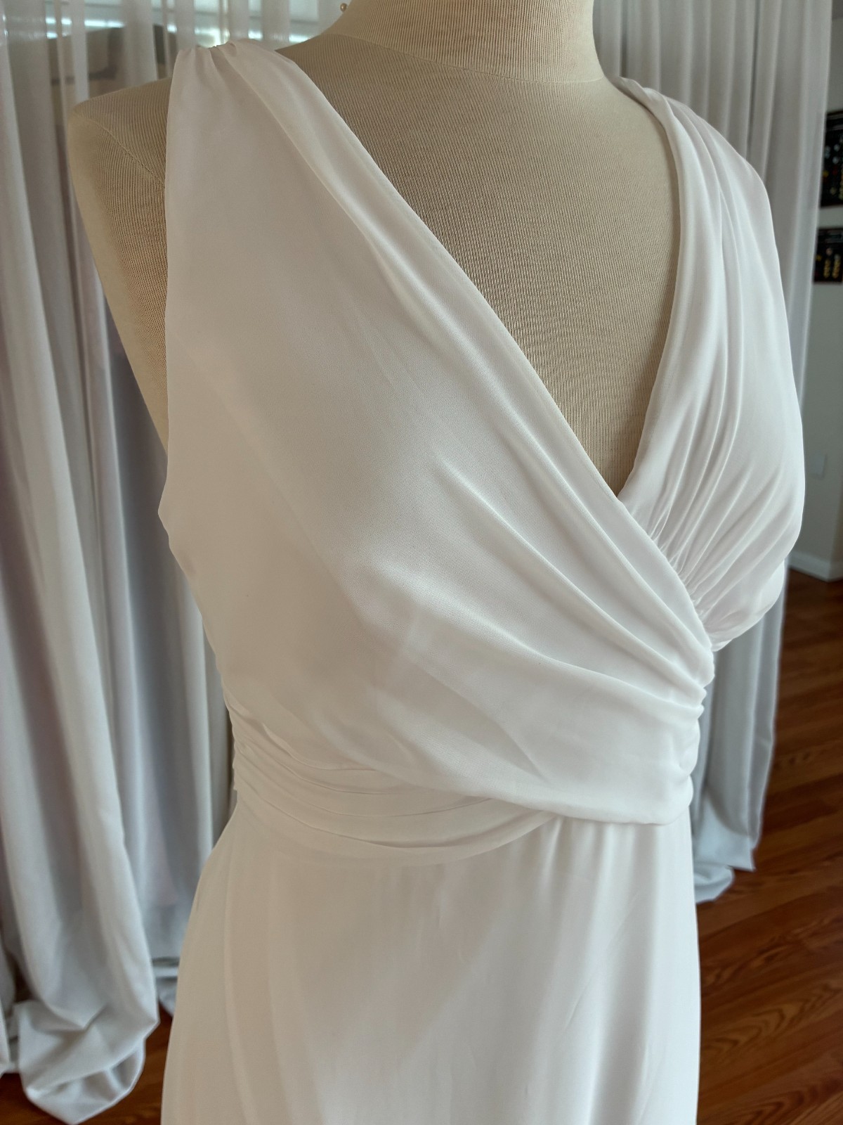 Simple bridal gown, suitable for a simple garden wedding. Stretch lining.