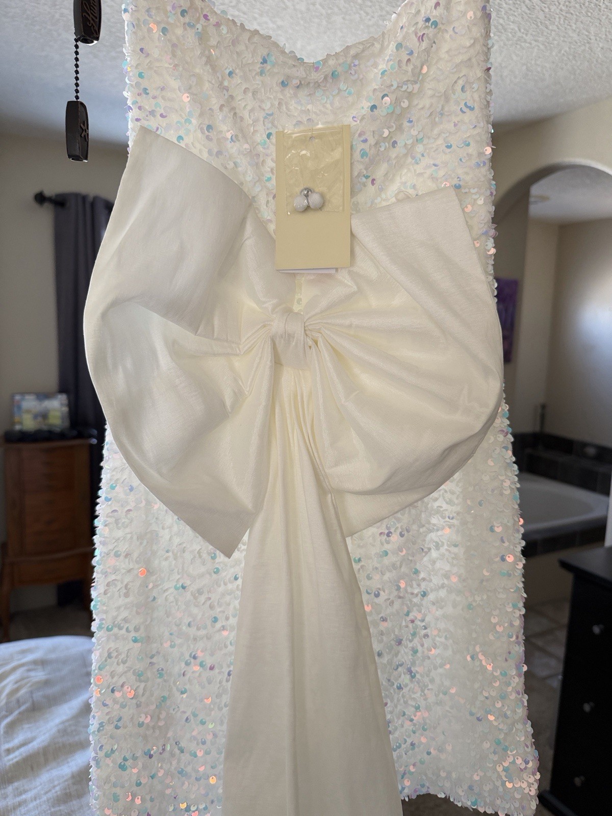 White Sequin Sleeveless V Neck Wedding Dress with Train and Large Bow