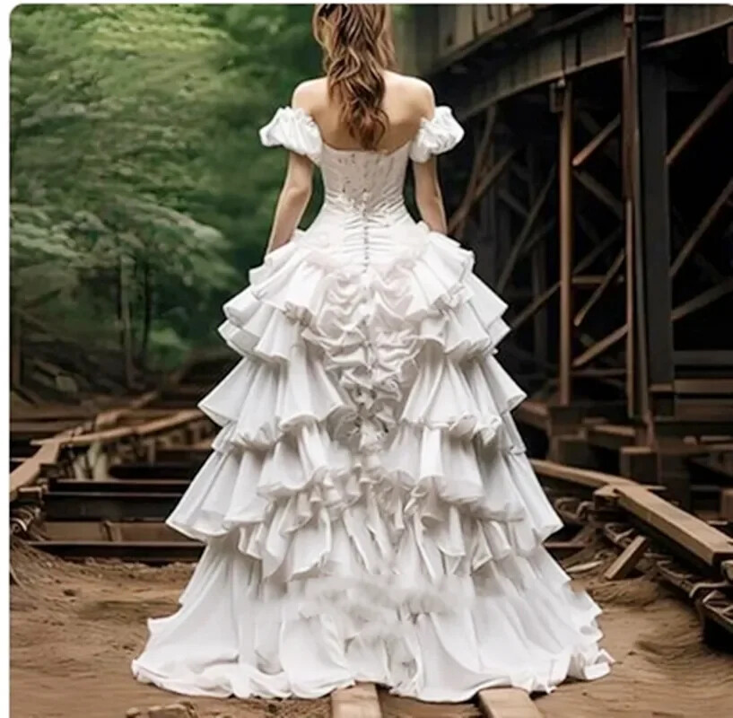 White Off‑Shoulder Wedding Gown Ruffled High‑Low Corset Gothic Bridal Gown Style