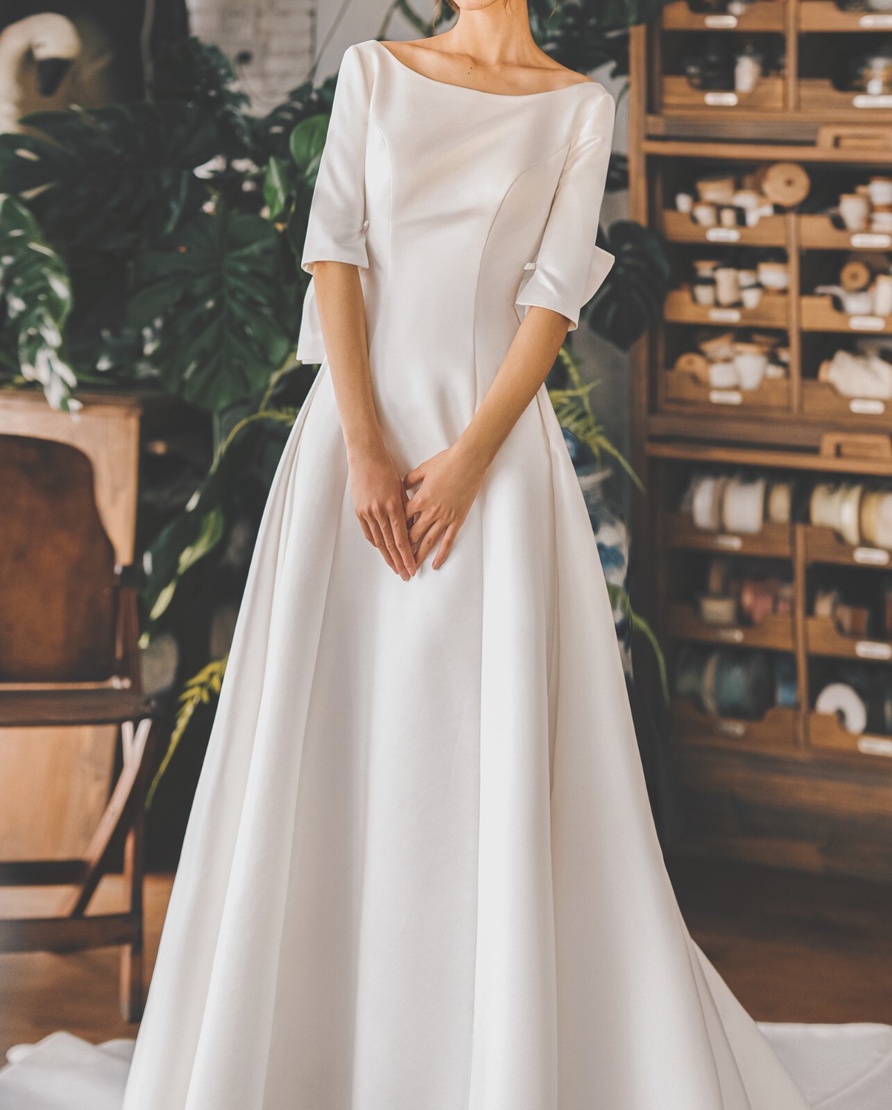 Ashley – bow back 3/4 sleeves boat neck A-line wedding dress.