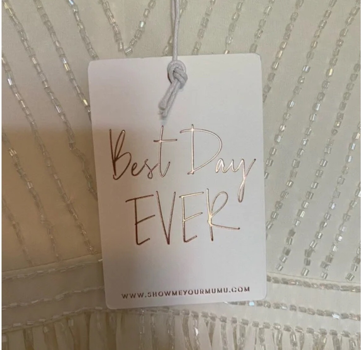Show Me Your MuMu white wedding dress with shimmery beading