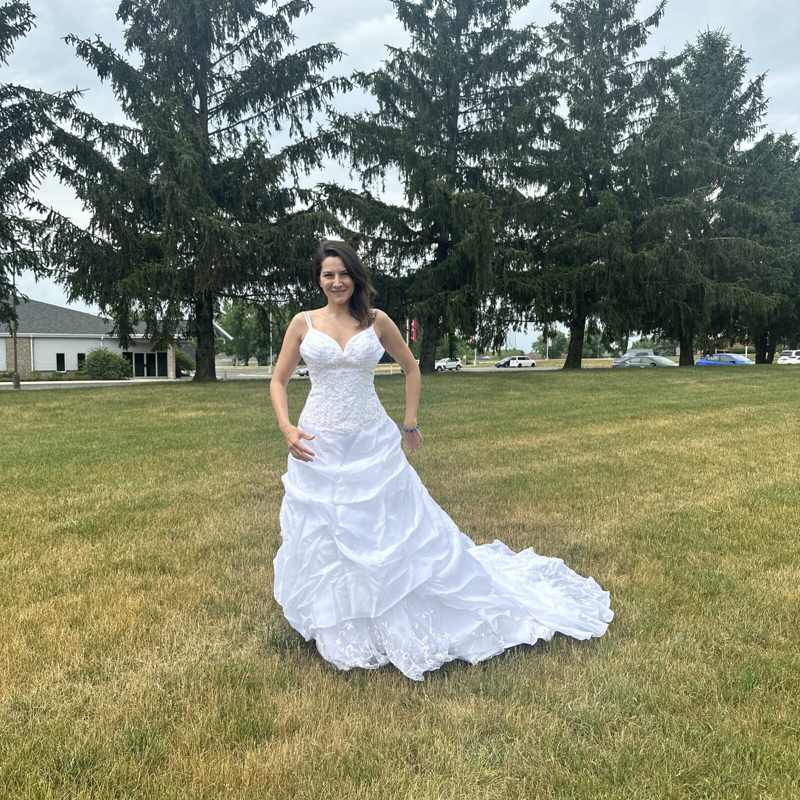 La Sposa Wedding Dress, gently used, size US 04 with a long beautiful train.