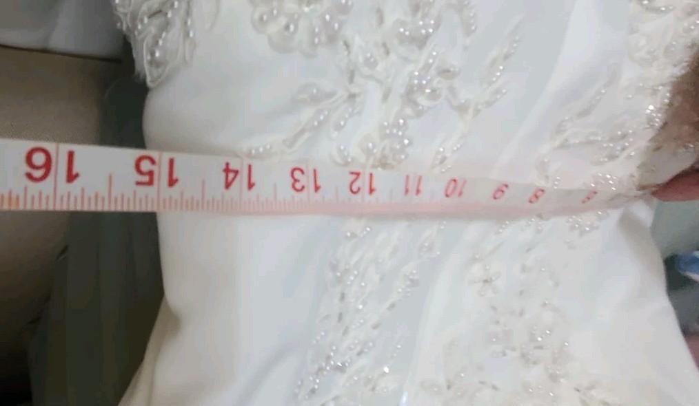 PC Mary’s wedding gown beautiful sweetheart neckline strapless