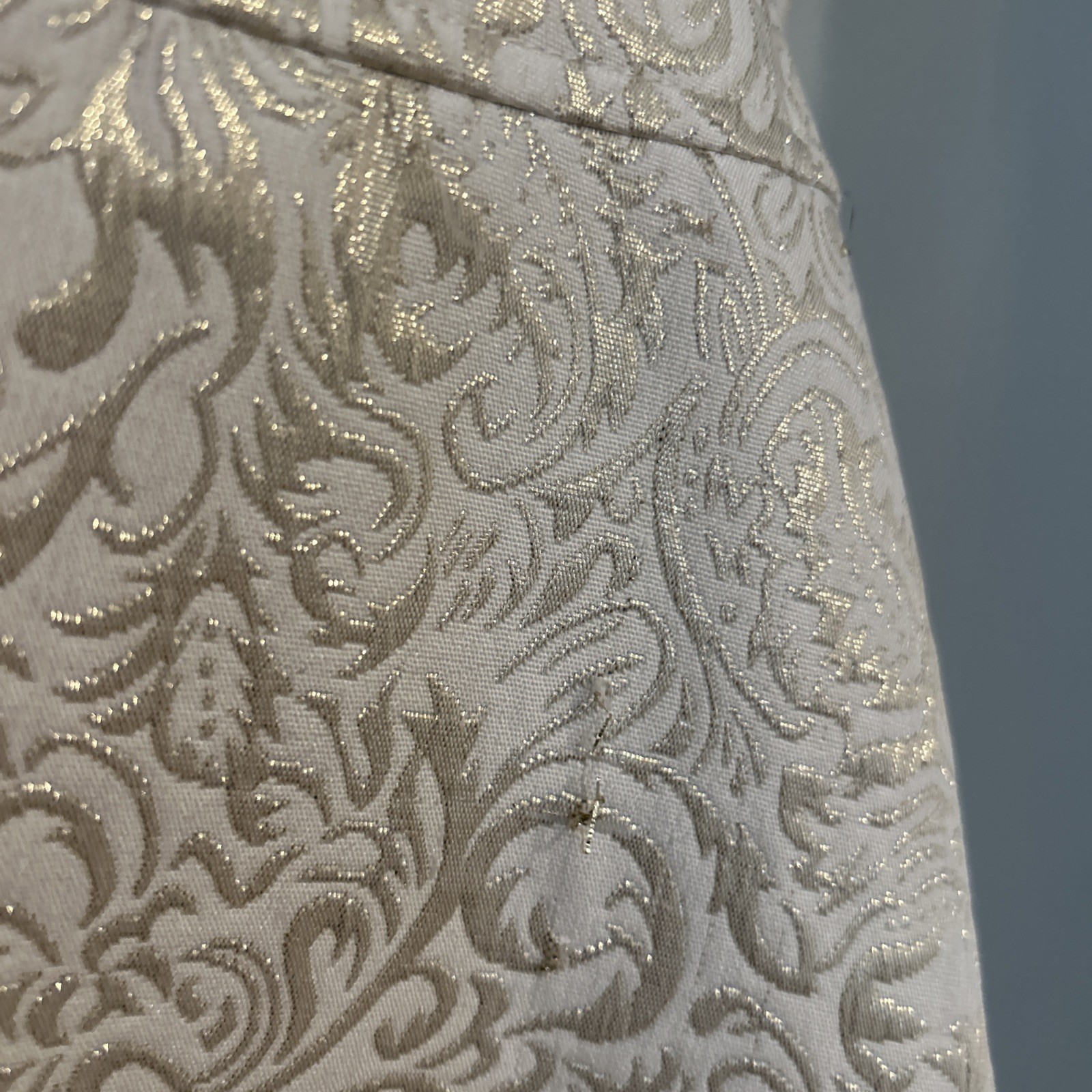 Vintage-style, tea-length halter wedding dress in champagne brocade.