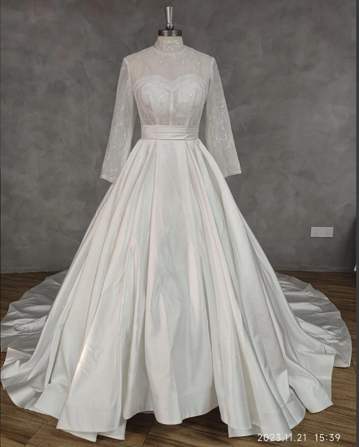 Wedding dress high neck long sleeves and long train with waist band and beading