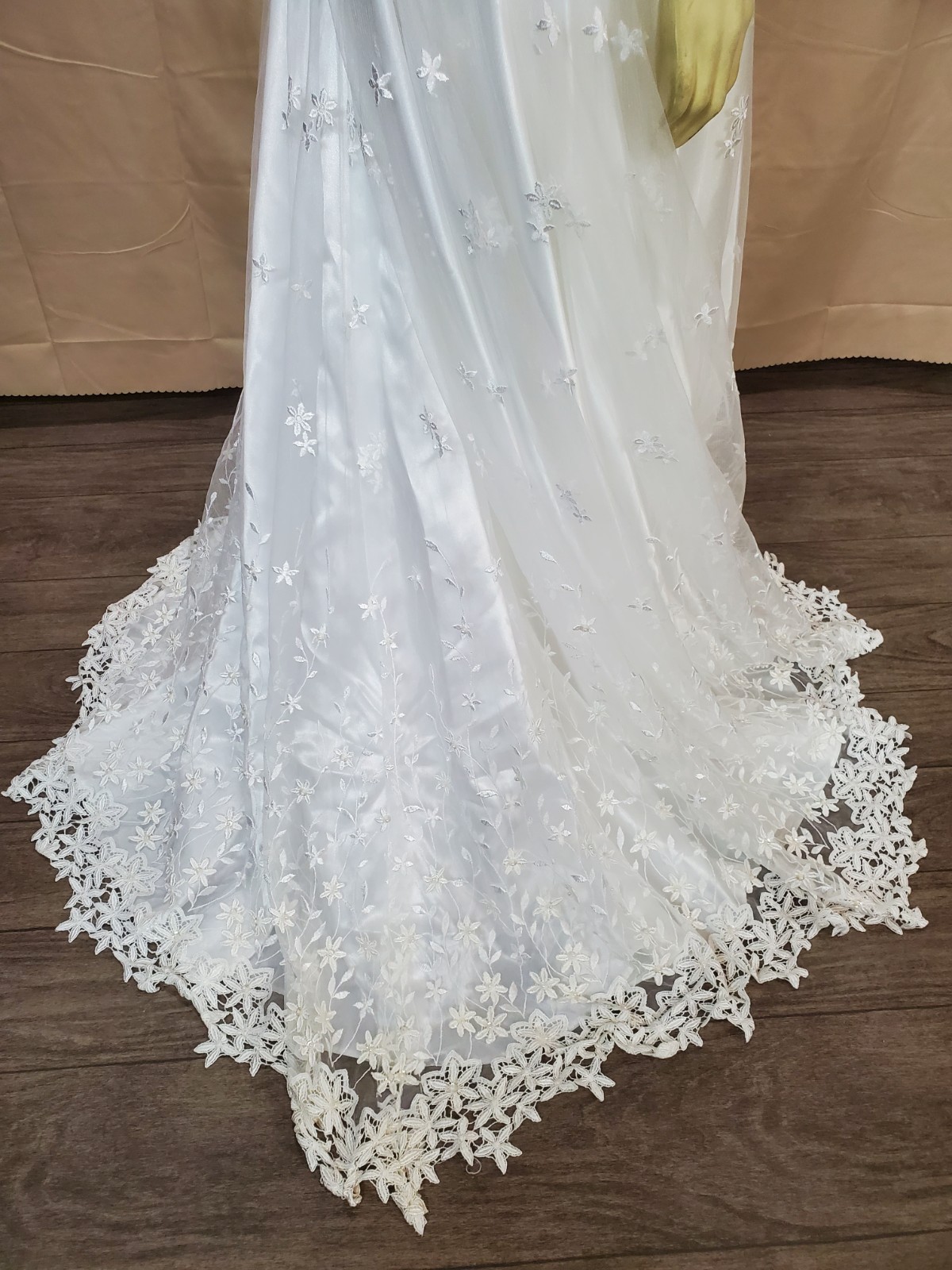 Mary’s bridal Floral lace applique on skirt and hem timeless silhouette.