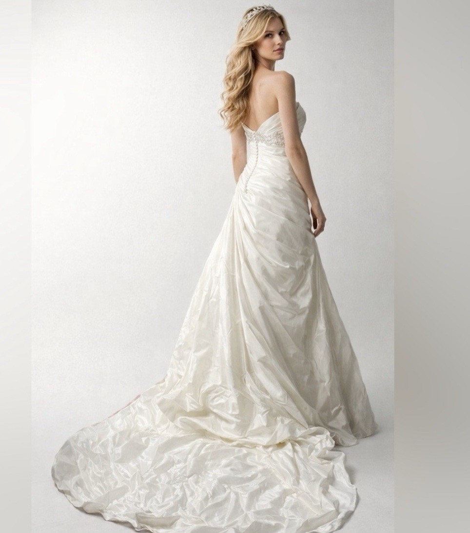 Elegant off white wedding Dress by Exclusive Bridals By A.c.e