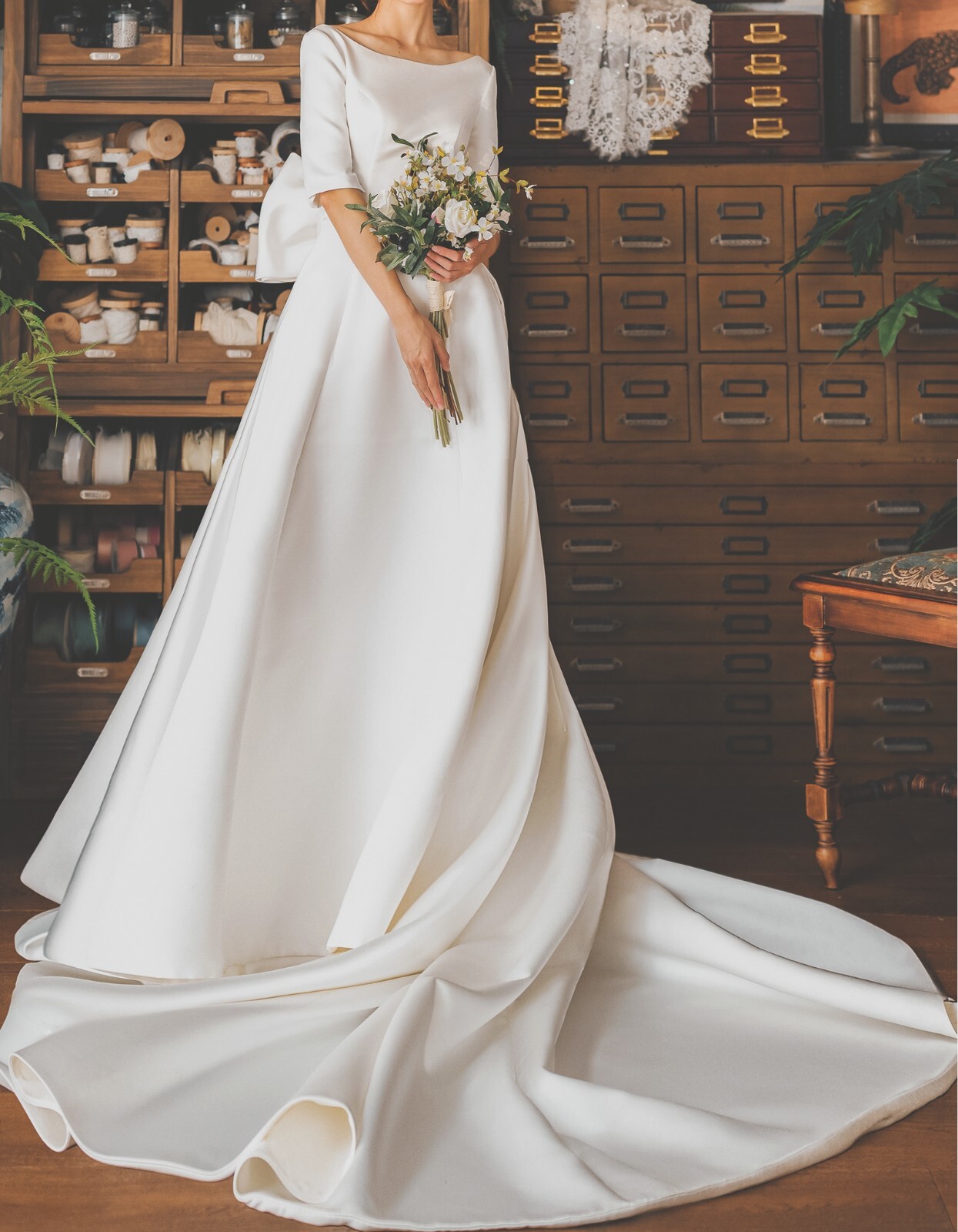 Ashley – bow back 3/4 sleeves boat neck A-line wedding dress.