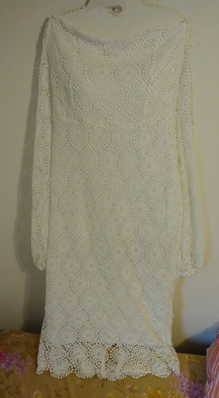Unbranded women’s off the shoulder long sleeved white crocheted wedding dress