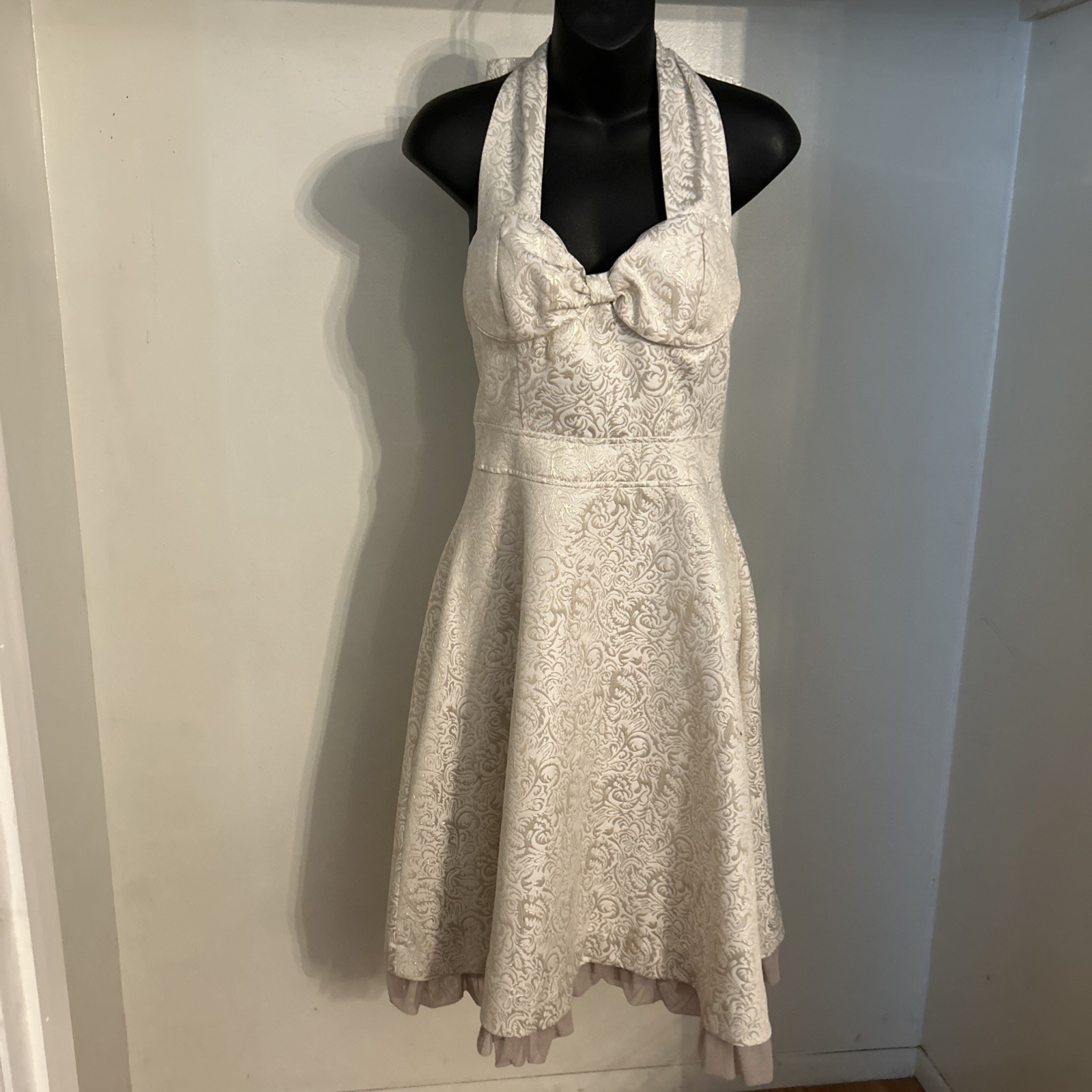 Vintage-style, tea-length halter wedding dress in champagne brocade.