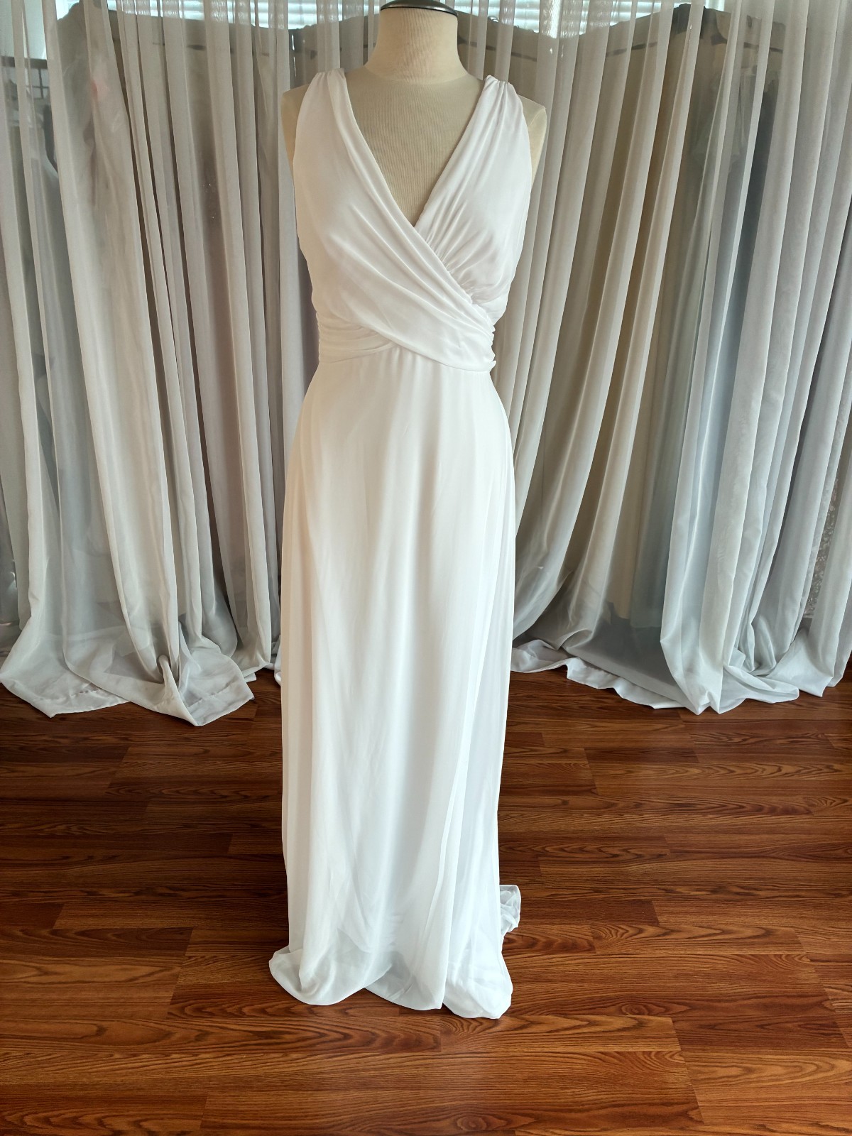Simple bridal gown, suitable for a simple garden wedding. Stretch lining.