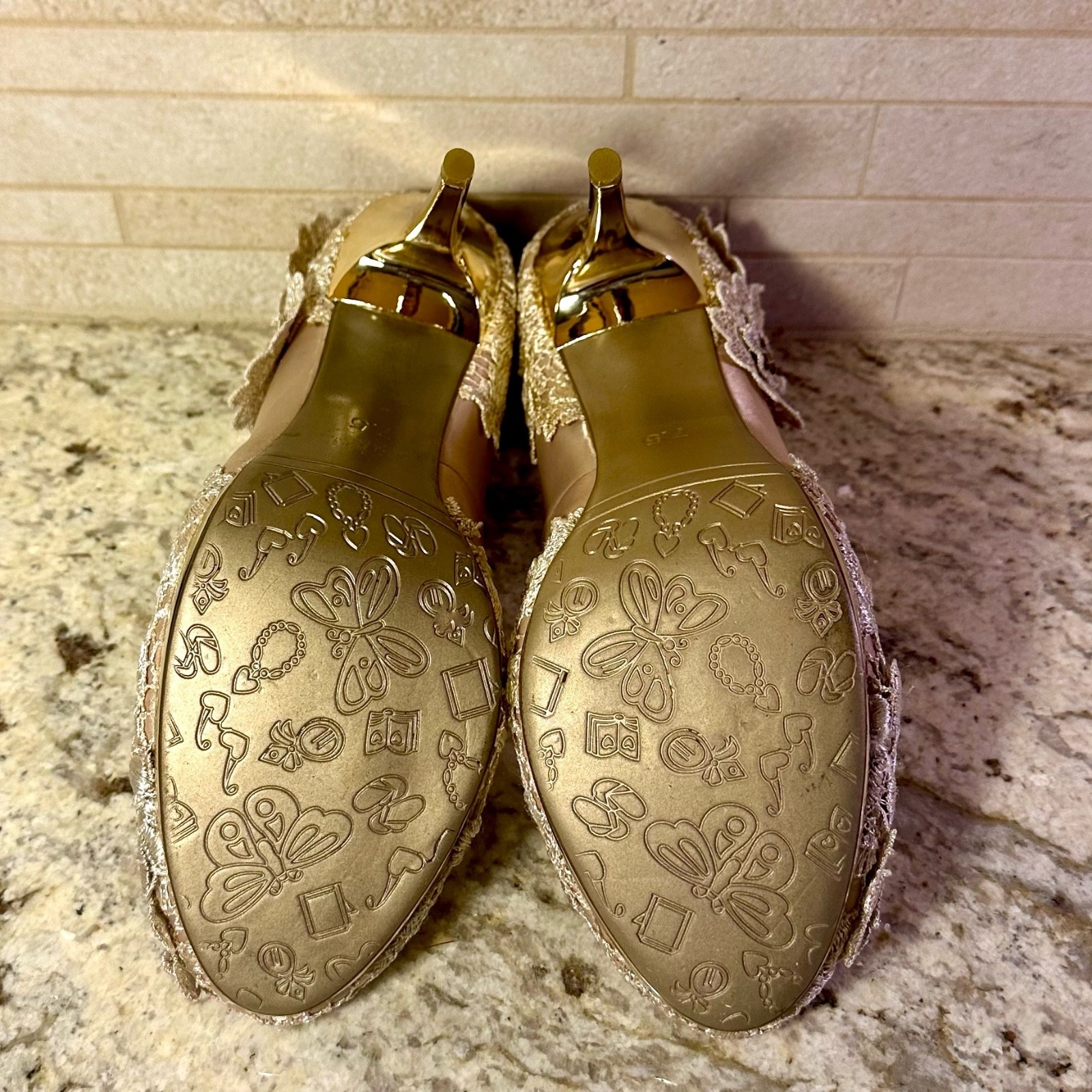Stella stilettos, pumps by Bella Belle, women’s size 7 1/2. In floral champagne