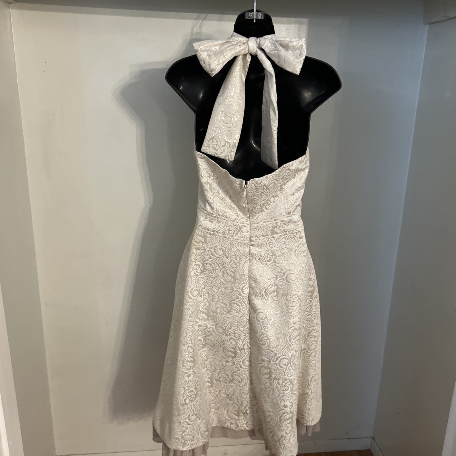 Vintage-style, tea-length halter wedding dress in champagne brocade.