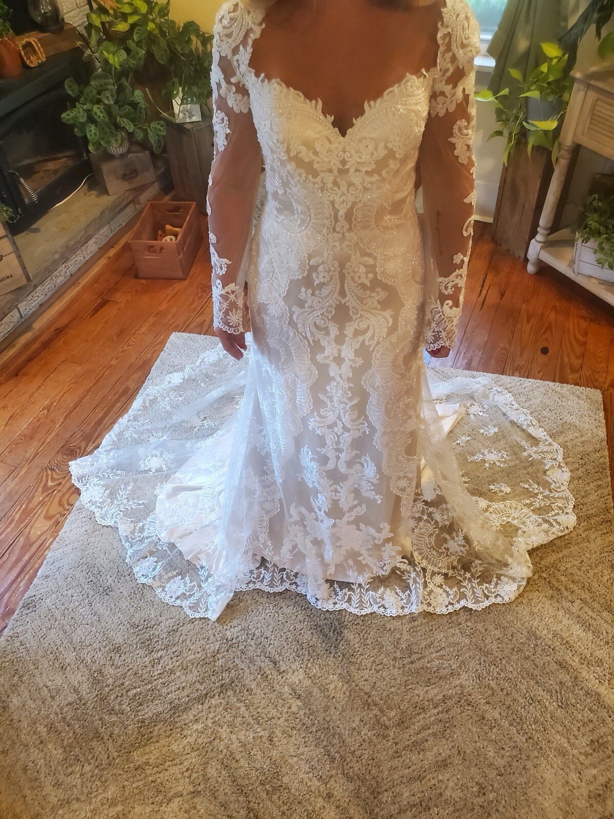 Wedding dress – Casa Blanca. Never worn, unaltered. Size 12. Champagne color