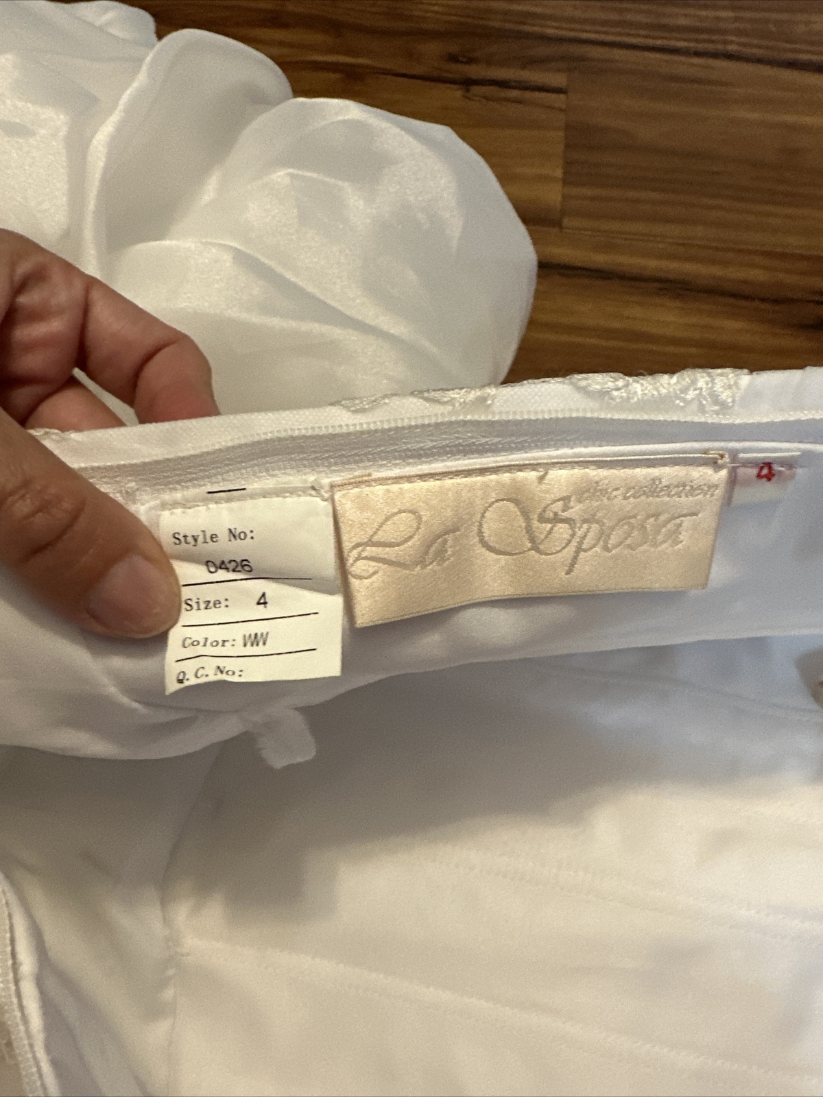 La Sposa Wedding Dress, gently used, size US 04 with a long beautiful train.