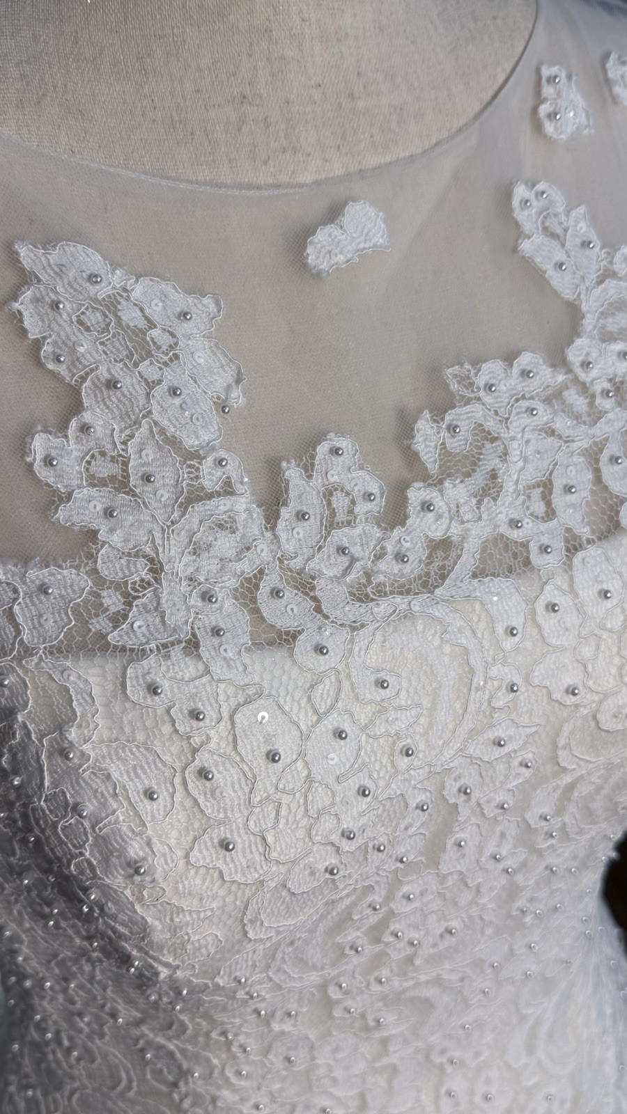 White tea length, size 10 wedding dress by Oleg Cassini