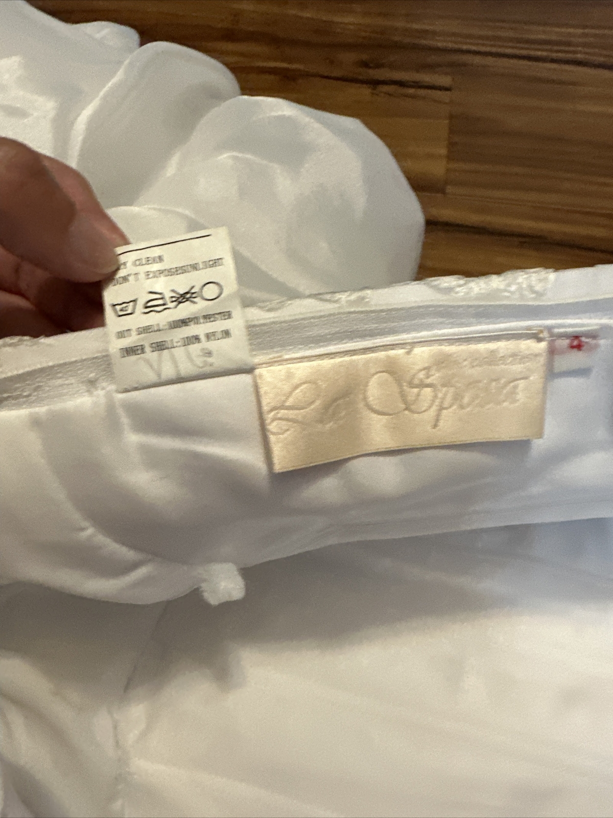 La Sposa Wedding Dress, gently used, size US 04 with a long beautiful train.