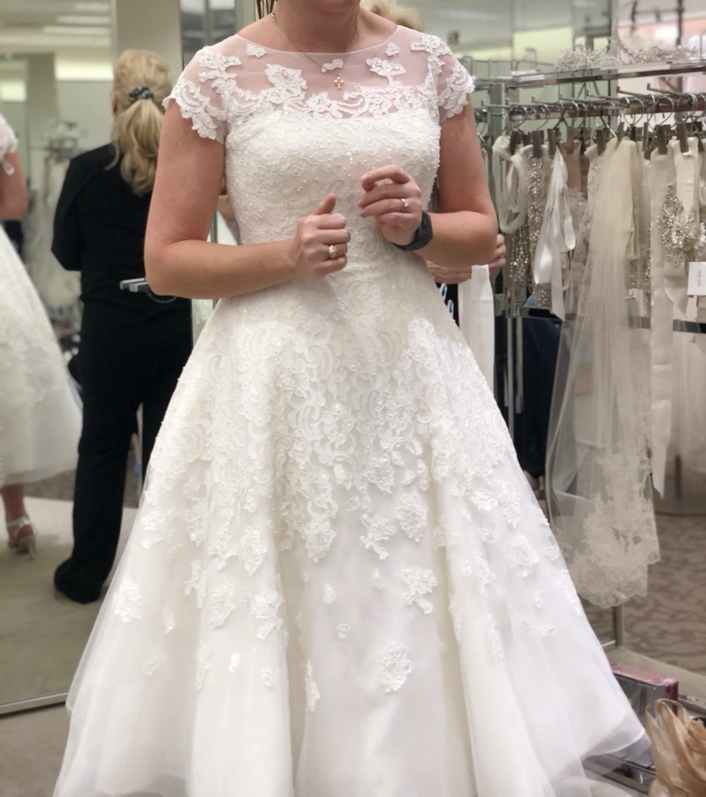 White tea length, size 10 wedding dress by Oleg Cassini