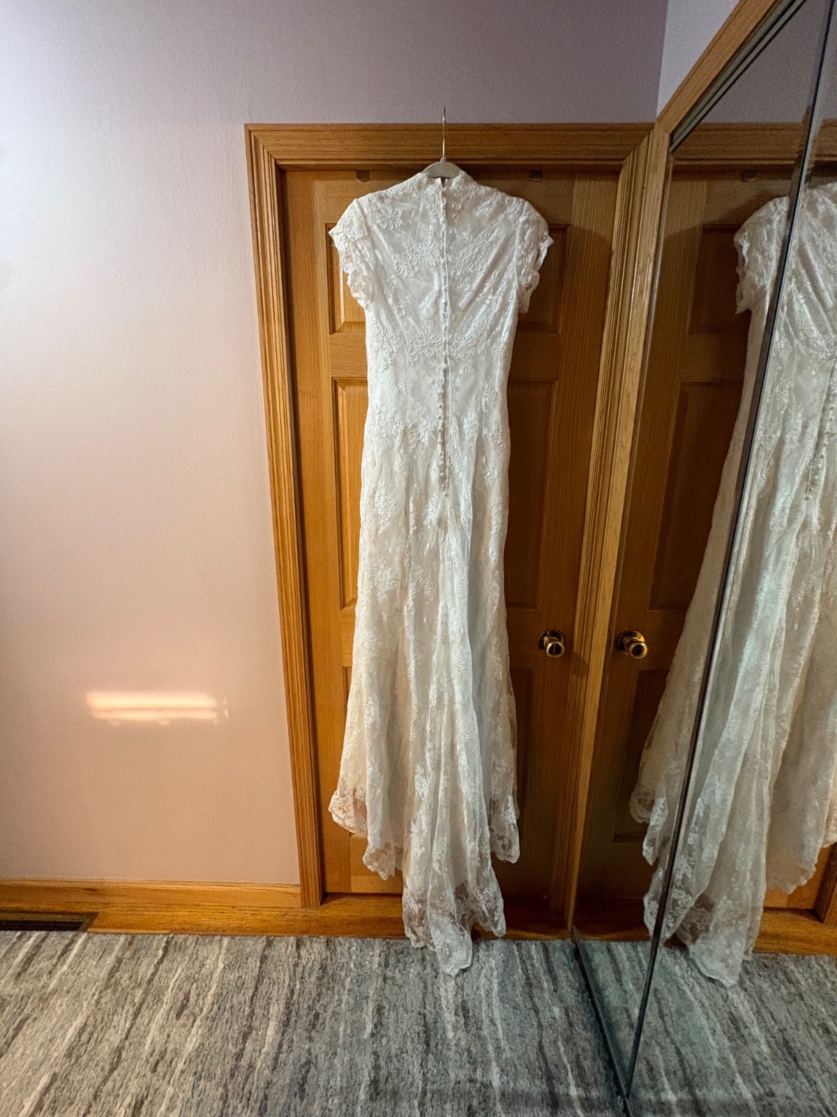 Preowned wedding dress size 4 with veil