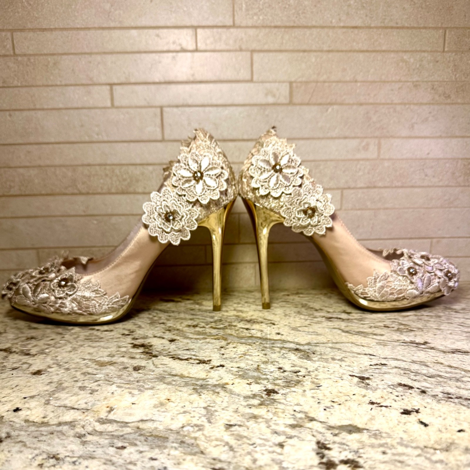 Stella stilettos, pumps by Bella Belle, women’s size 7 1/2. In floral champagne