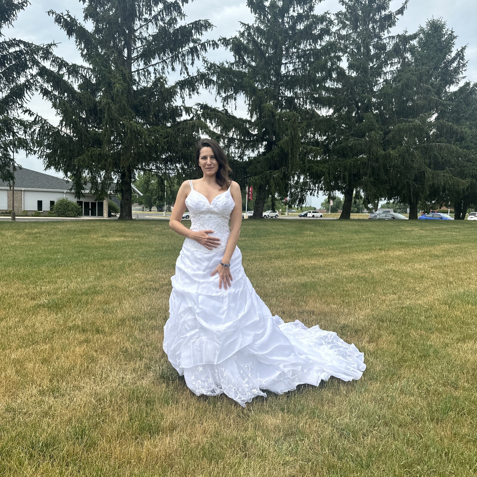 La Sposa Wedding Dress, gently used, size US 04 with a long beautiful train.