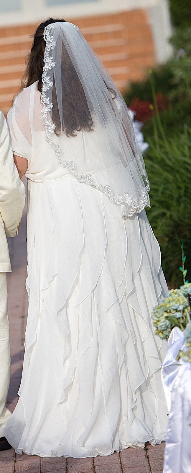 Soft & Flowing Ivory Wedding Dress by Galina Woman Size 20W, with matching Cape.