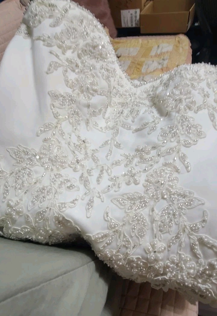 PC Mary’s wedding gown beautiful sweetheart neckline strapless