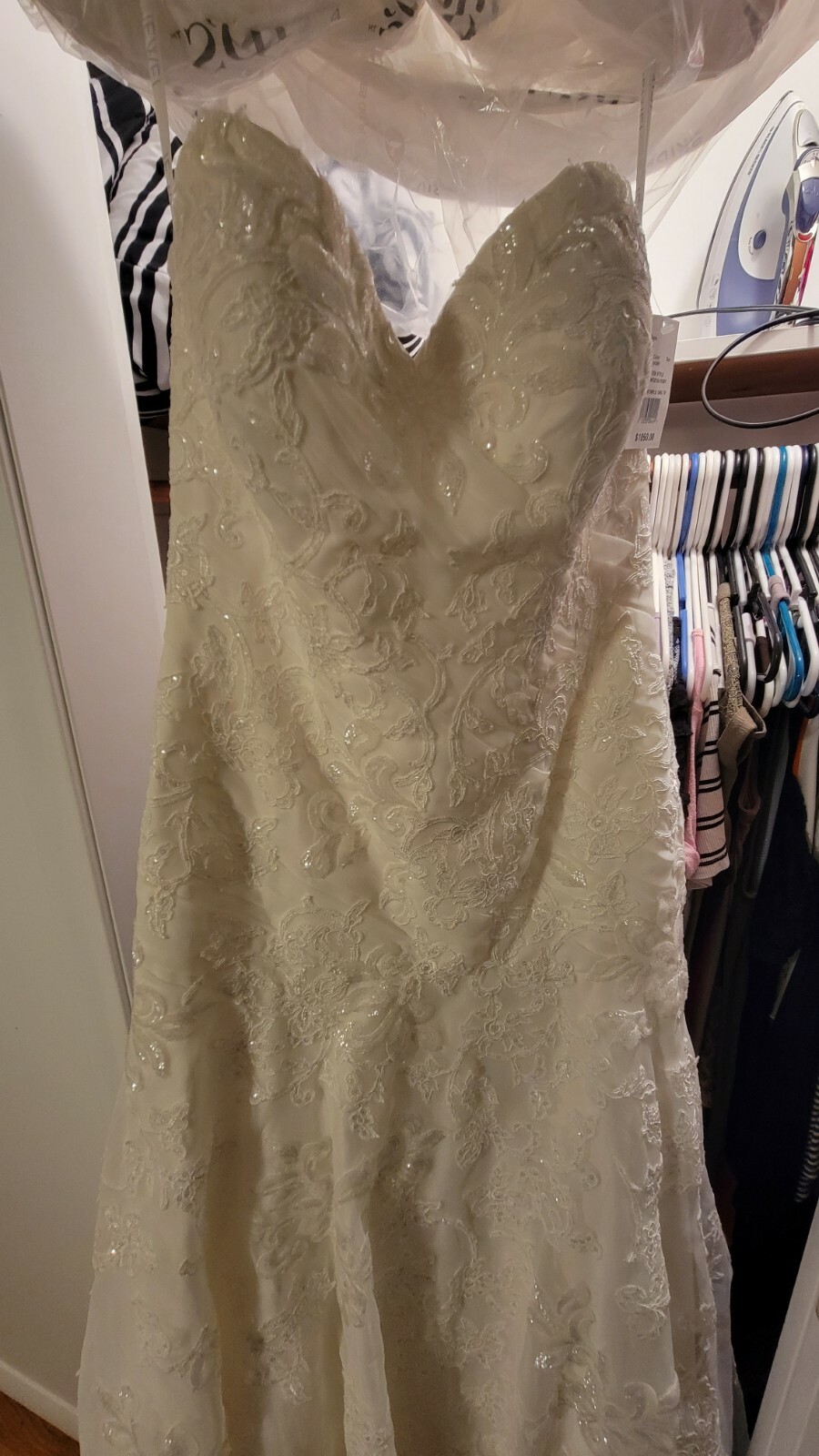 Brand New With Tags Women’s wedding gown Size 8 Never worn. Mermaid style.