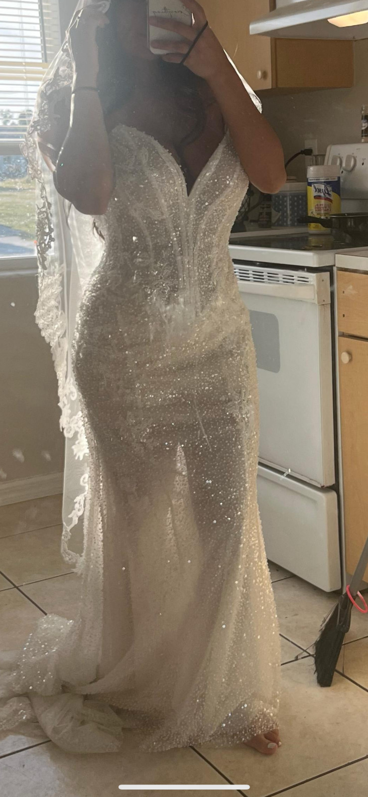 Beautiful wedding dress veil included! Rivera counture