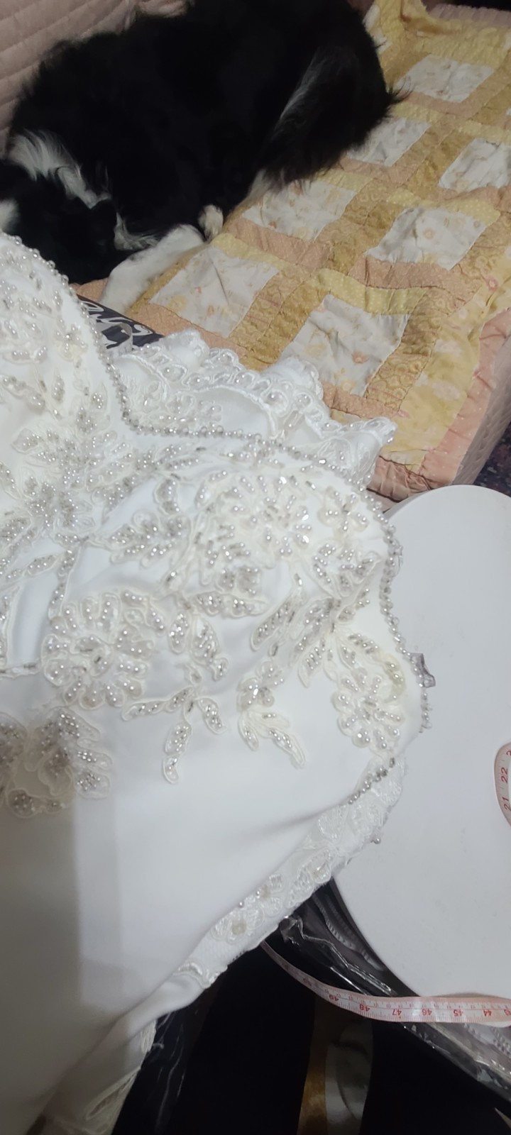 PC Mary’s wedding gown beautiful sweetheart neckline strapless