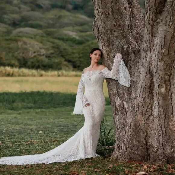 Mermaid wedding dress with bell sleeves and crochet lace off the Shoulder